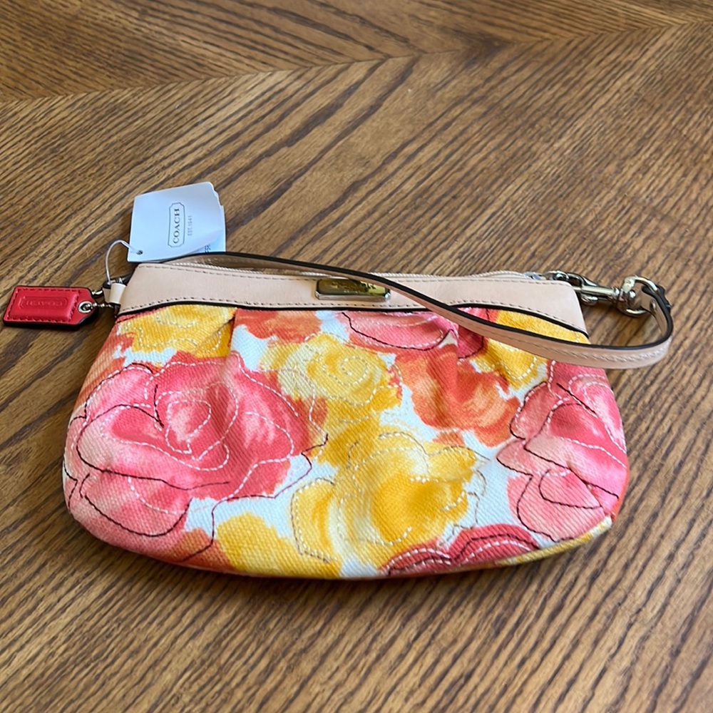 Coach floral printed wristlet with zippered area